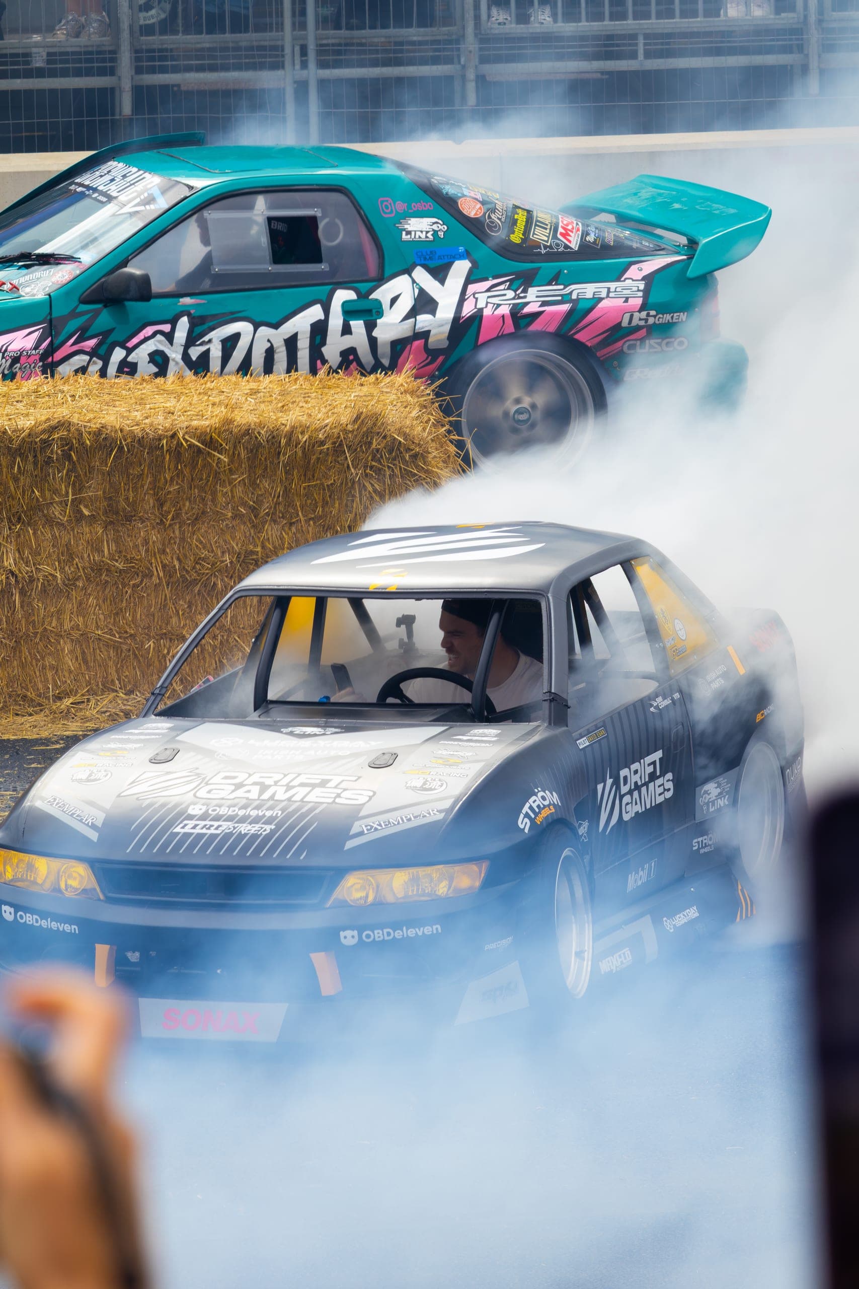 A drift car disappearing into its own tyre smoke, Gravity 2026
