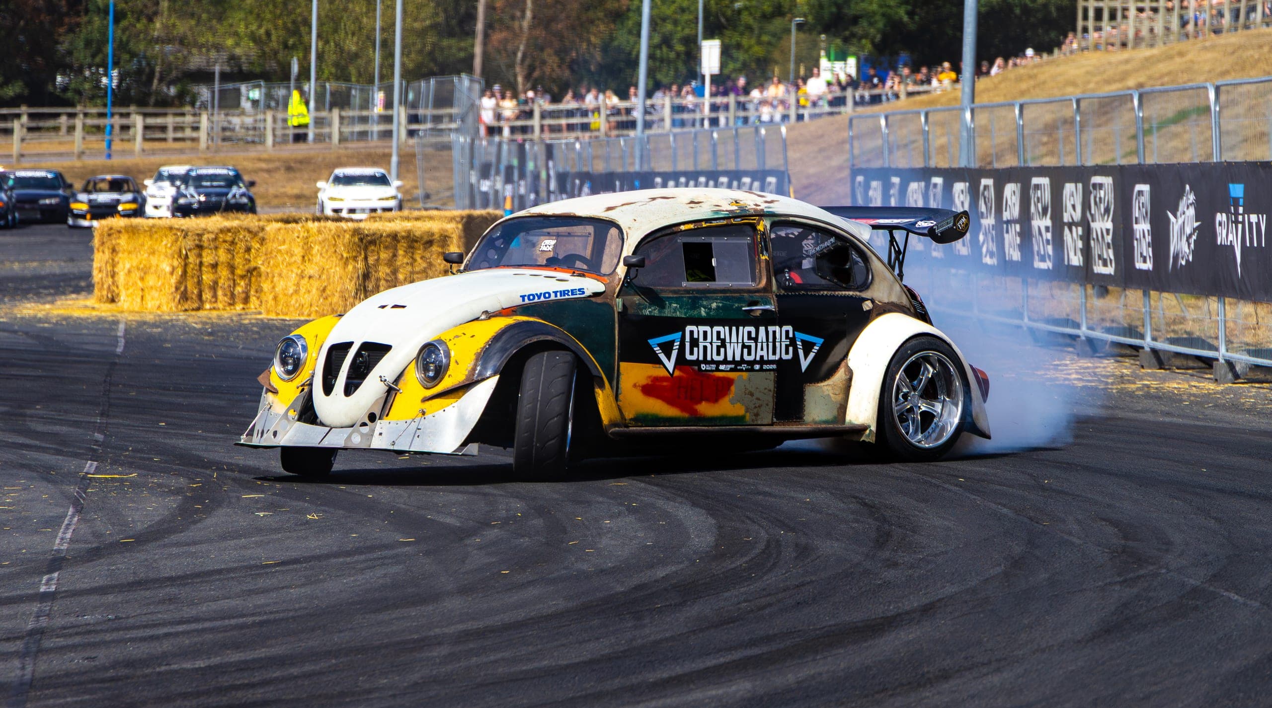A widebody Beetle drift car mid-run, Gravity 2026