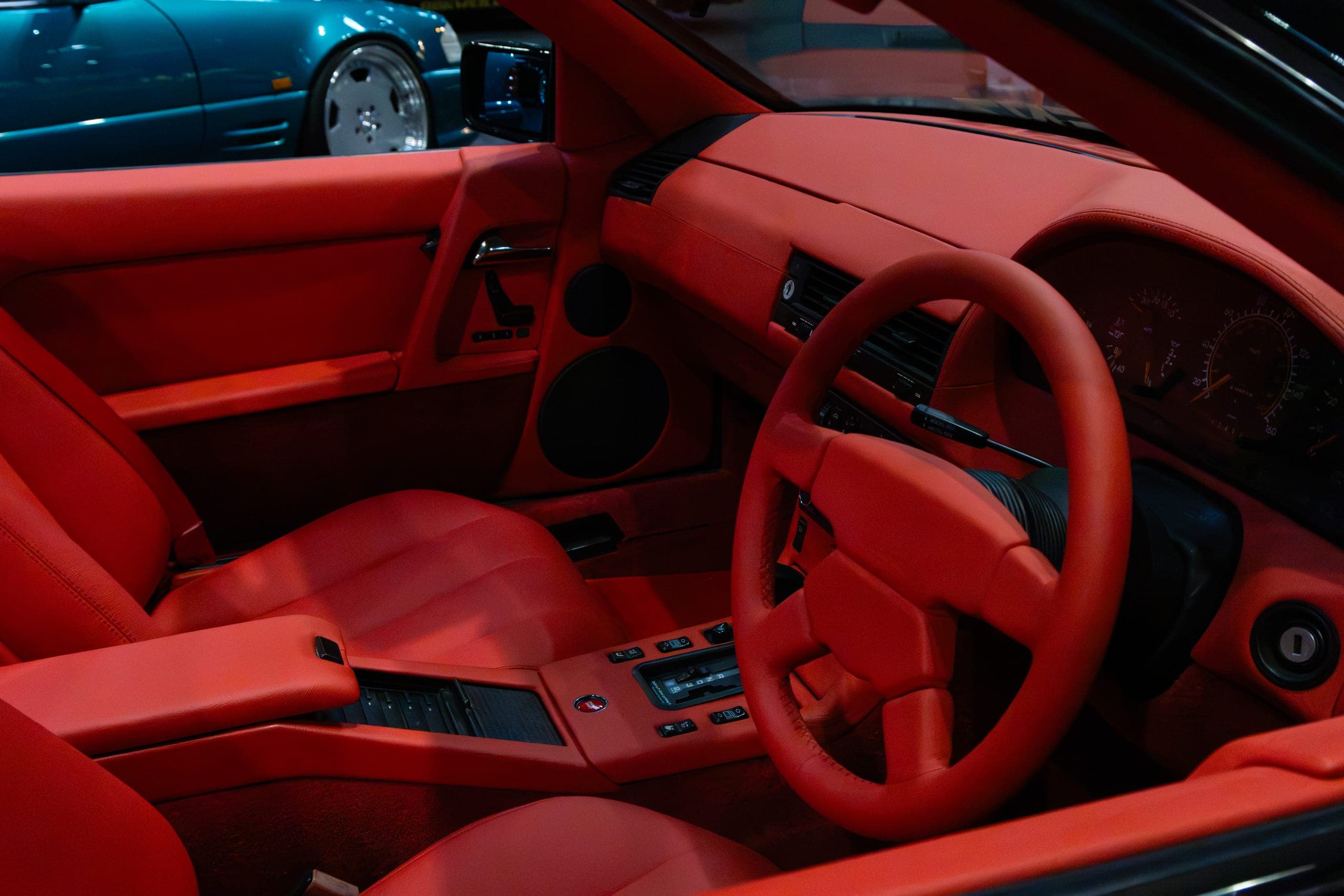 A red leather interior and steering wheel, Gravity 2026