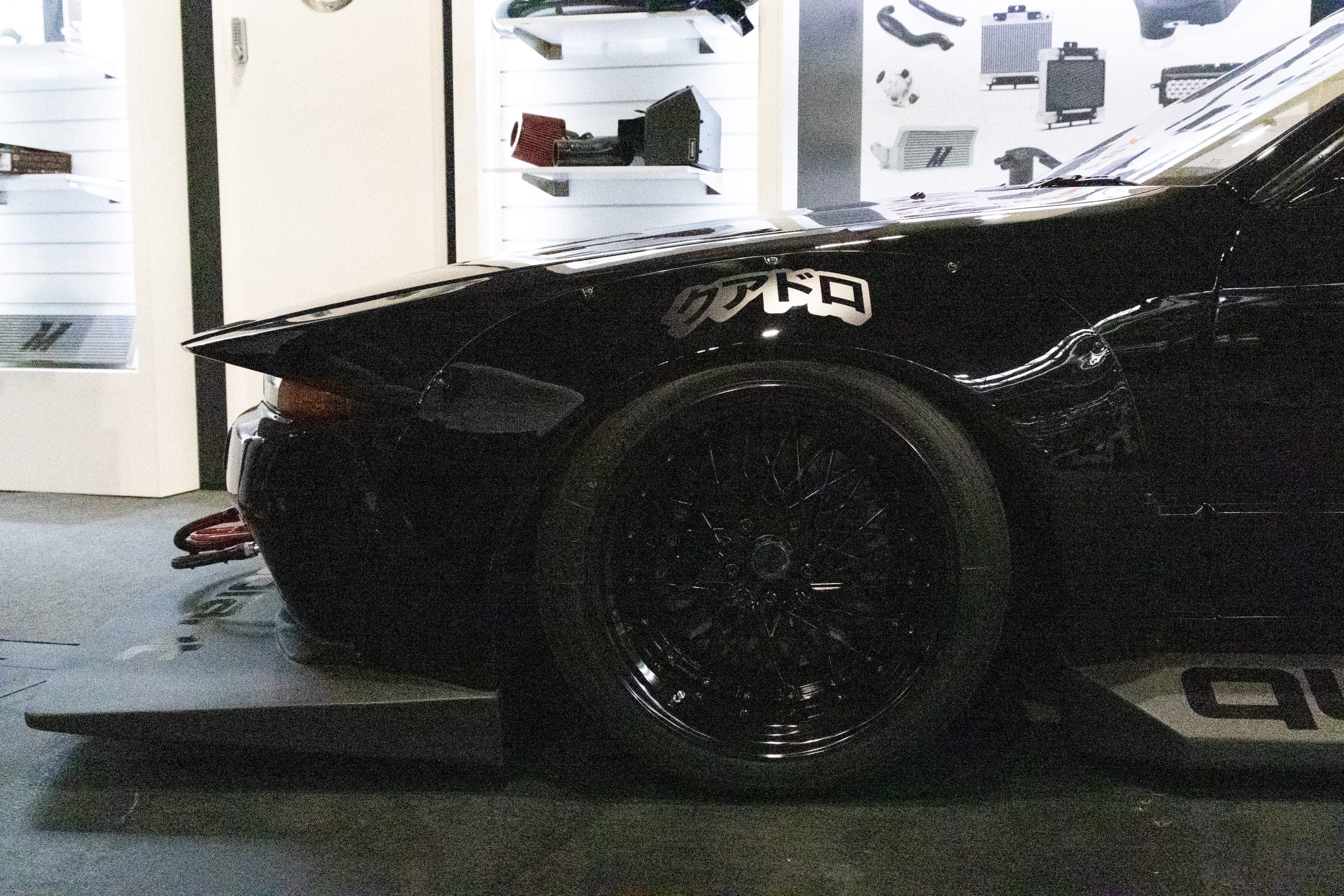A matte black wheel and arch, Gravity 2026